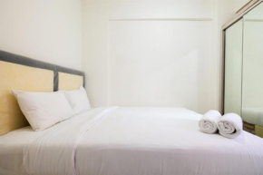 Comfortable 2BR Green Pramuka City Apartment By Travelio